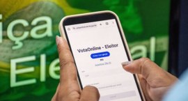 A imagem mostra uma pessoa segurando um smartphone, acessando uma página chamada “VotaOnline - E...